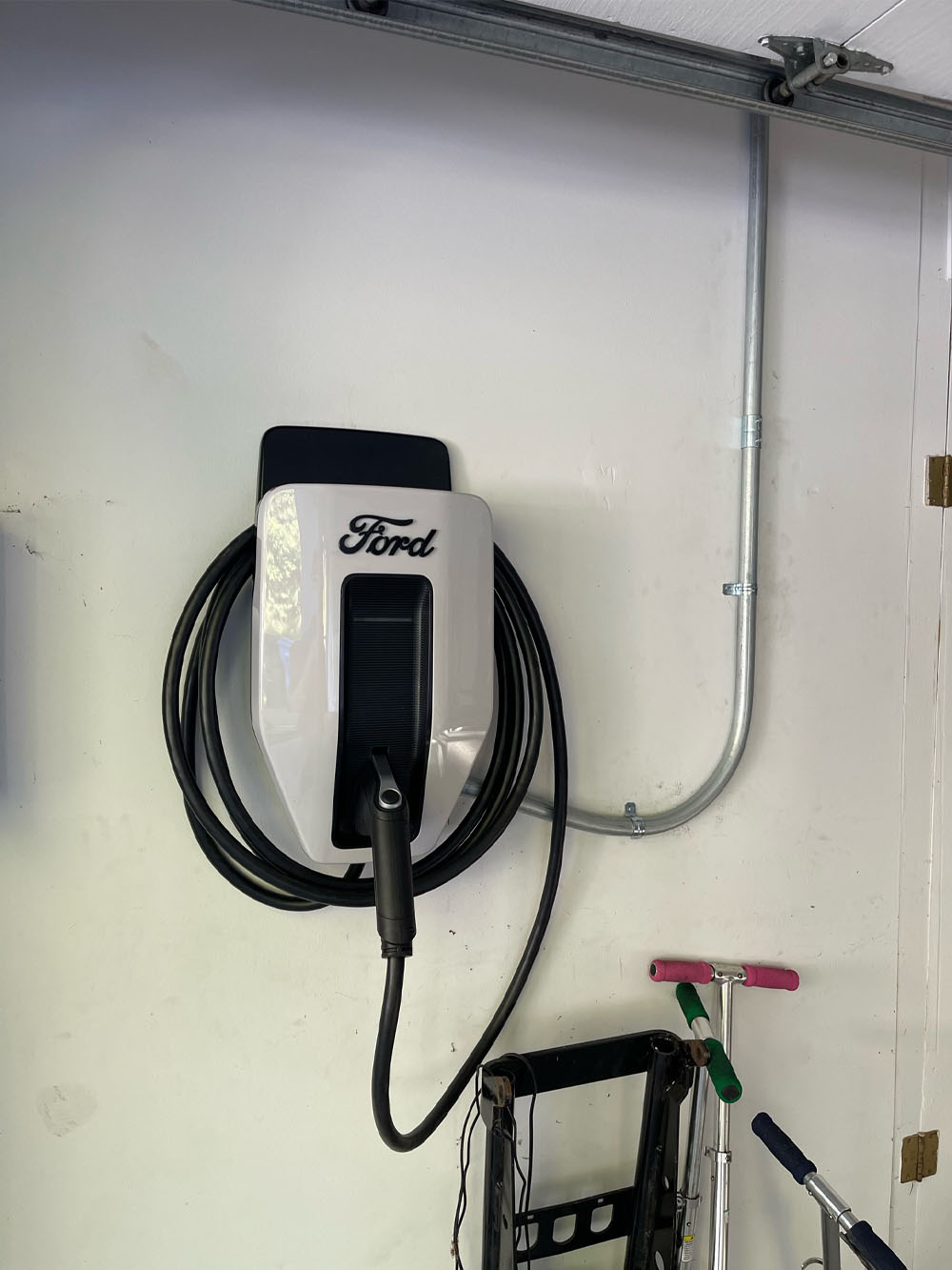 Ford Charge Station Pro 48A mounted in garage