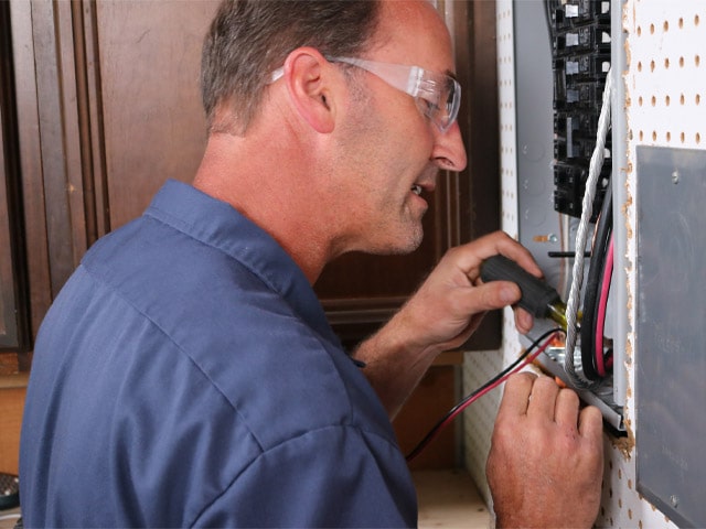 Picture of electrician providing electrical upgrades