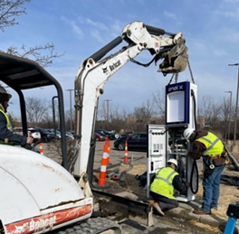 Image of the crew at State Electric Company installing a Level 3 EV charging station at the Cadillac of Novi. 